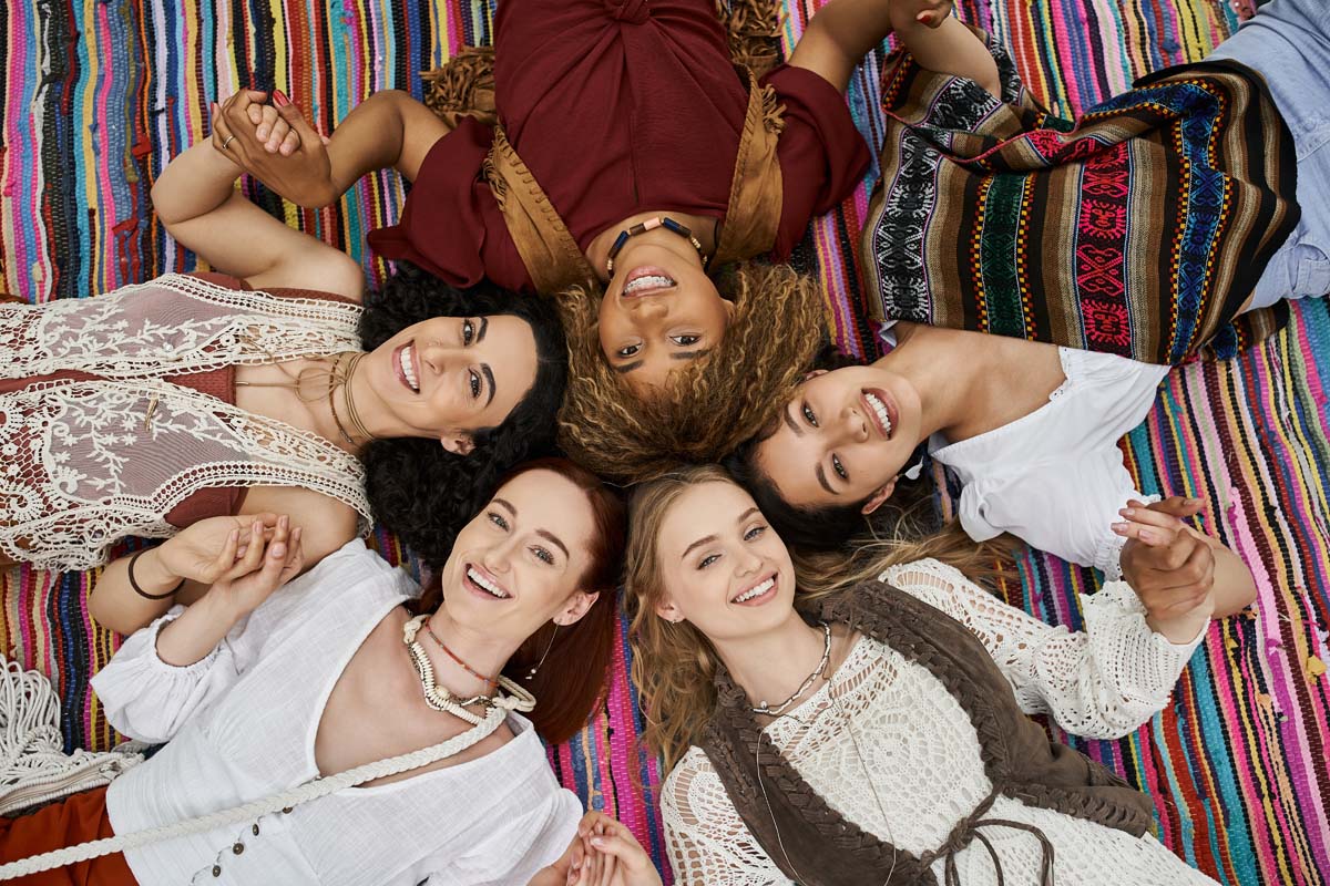 top view of cheerful interracial women