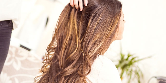 Girl getting her hair done at Melbourne's best salon